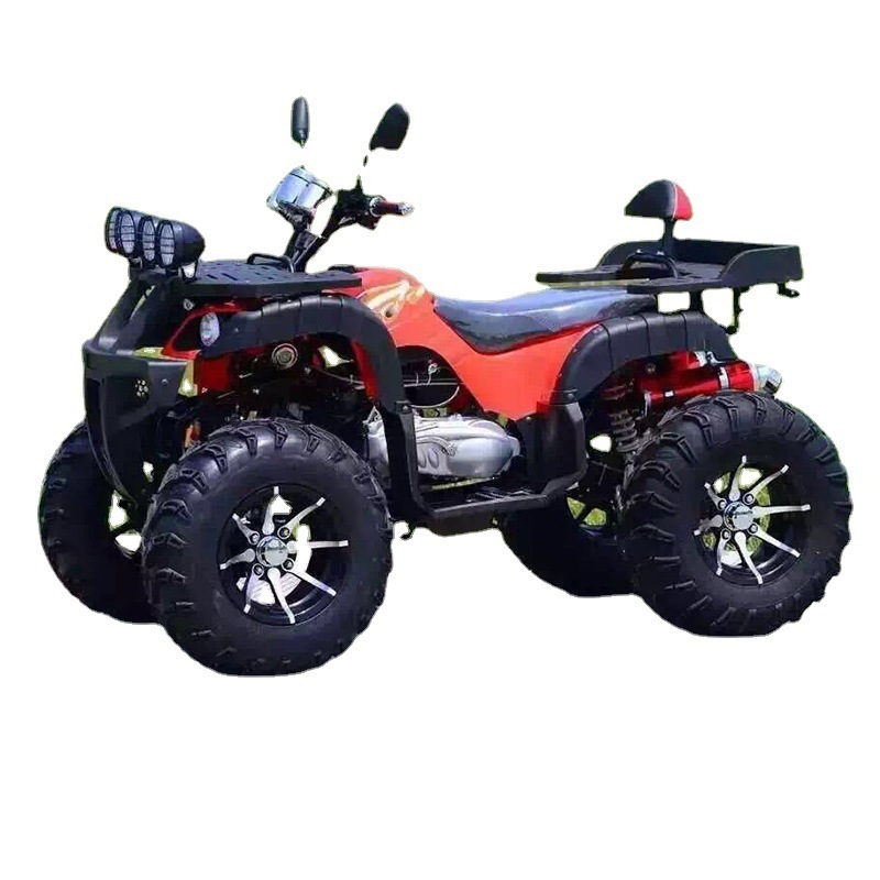 Red four-wheel ATV with black frame, single seat, racks, handlebars and knobby tires on a white background.